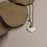 "Sansa" a delicate brass necklace hand made in Milwaukee WI by jewelry designers at Cival Collective.