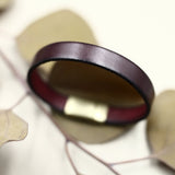 Close up of the CIVAL "Ace" Italian leather bracelet in Mahogany and closed with magnetic clasp.