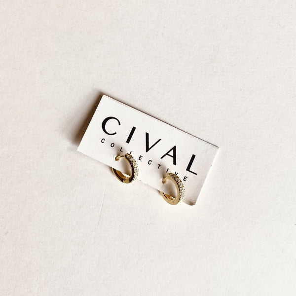 close up of gold fill faye hoops on earring card