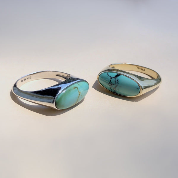 Natural Turquoise and sterling silver signet style ring with east west setting by Cival Collective. 