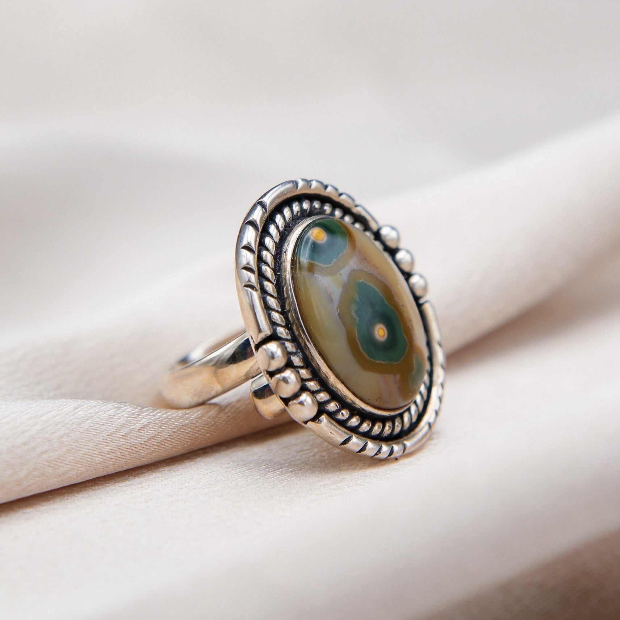 Close up of Ocean Jasper ring, adjustable sterling silver 