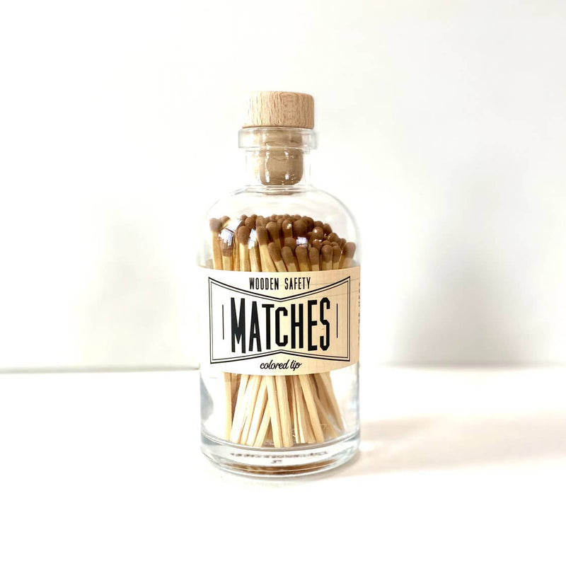 5.5" high x 2.5" wide jar 100 matchsticks at 3.5" tall Wooden cork top with logo Vintage style label with striker