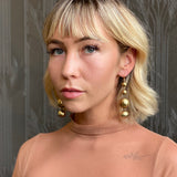 moira earrings on model, large ball drop earrings
