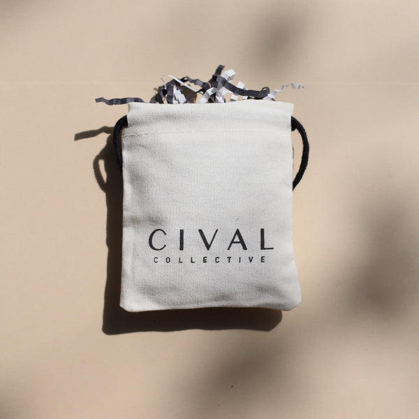 close up of a cival collective cloth jewelry bag