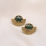 Close up of “Andy” post earrings, half moon brass with moss agate 