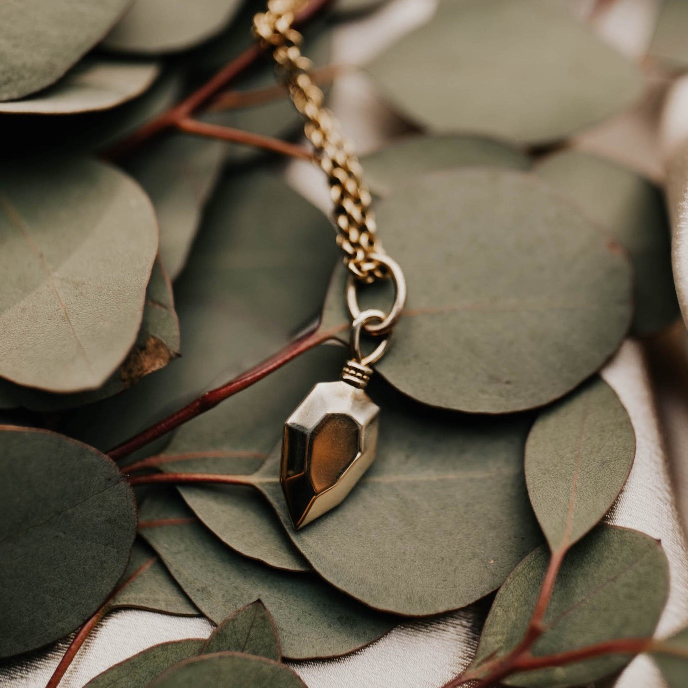 Cast Brass Arrow Pendant Necklace made at Cival Collective, Milwaukee jewelry store.