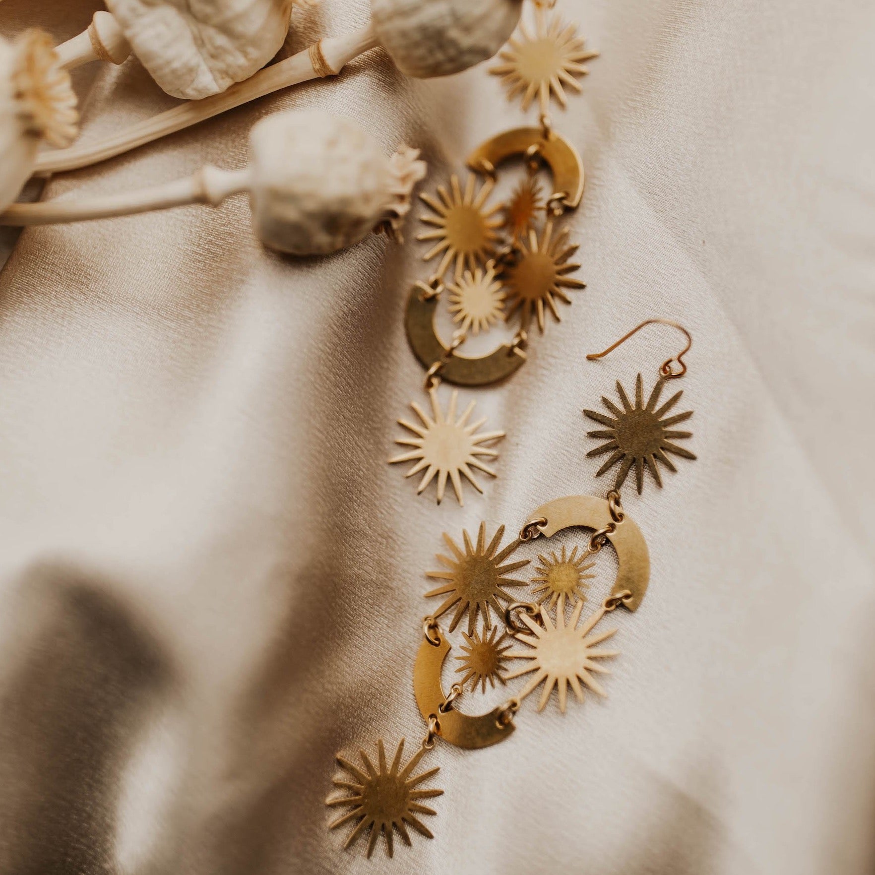 close up of helios, sunburst statement earrings 