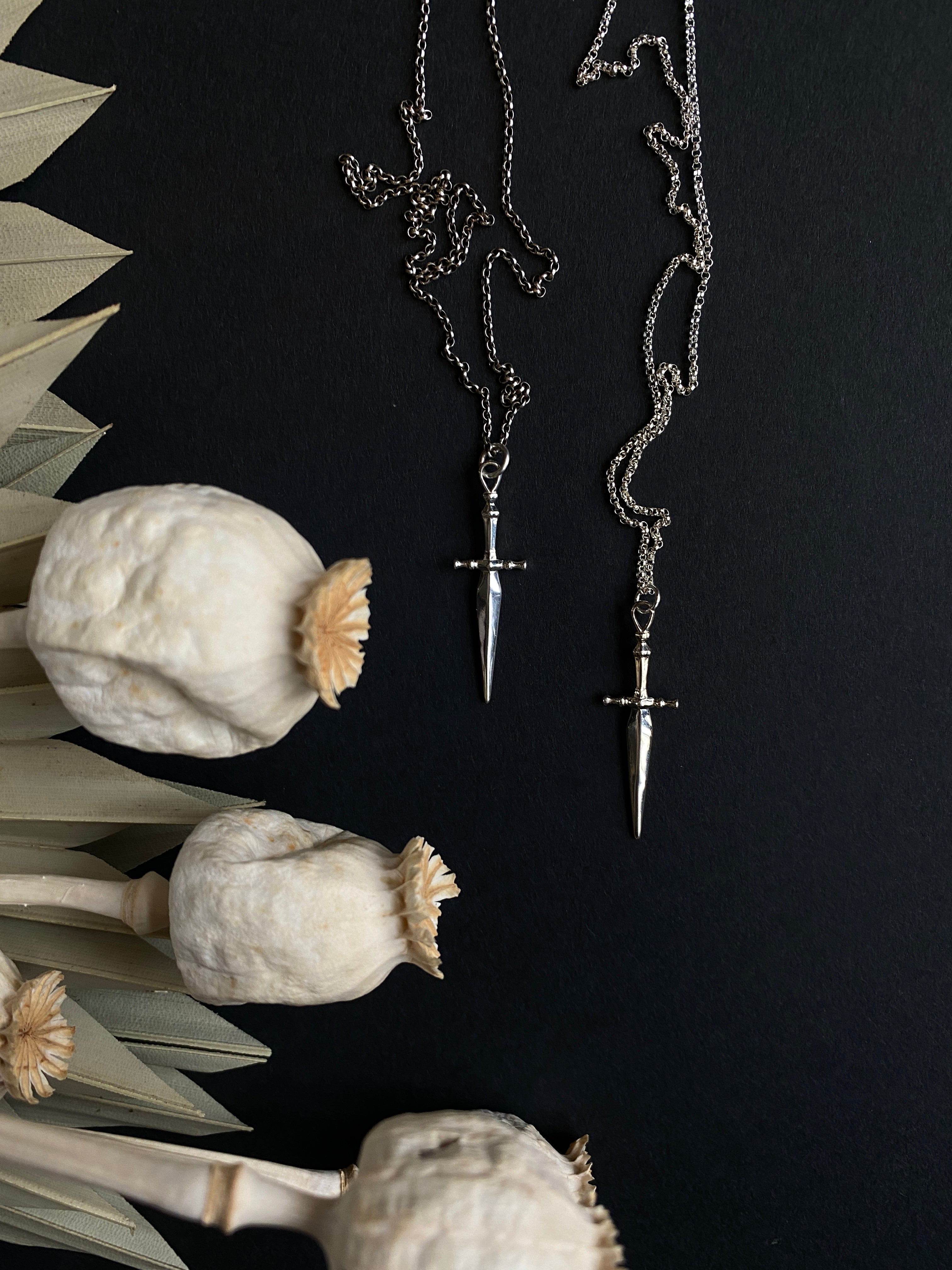 two Sterling Silver cast knife necklaces from Cival Collective, a jewelry store in Milwaukee, WI