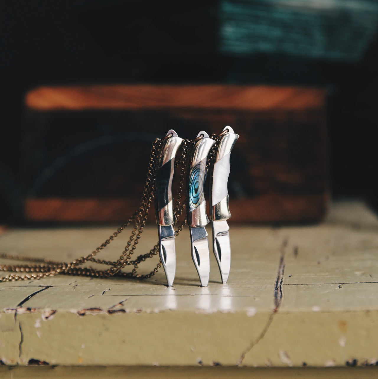 Pocket knife necklace at Cival Collective, a Jewelry Store in Milwaukee