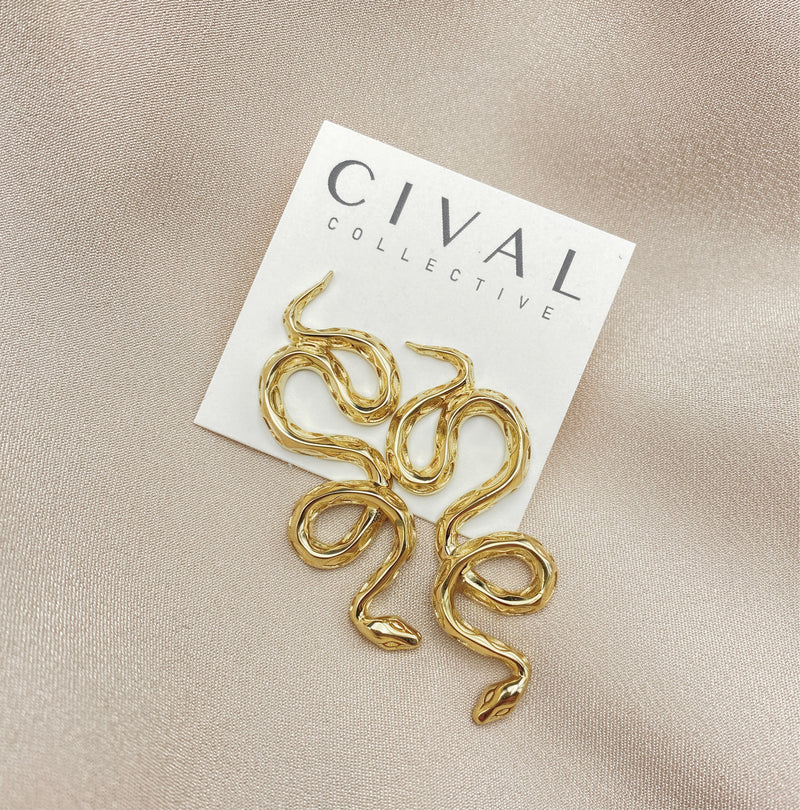 Twisting snake earrings designed by Milwaukee creative jewelry company Cival  - the snake represents new beginnings and rebirth