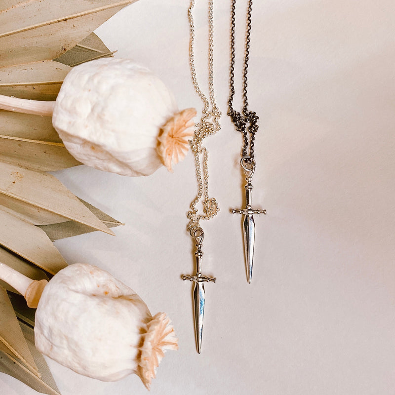 two Sterling Silver cast knife necklaces from Cival Collective, a jewelry store in Milwaukee, WI