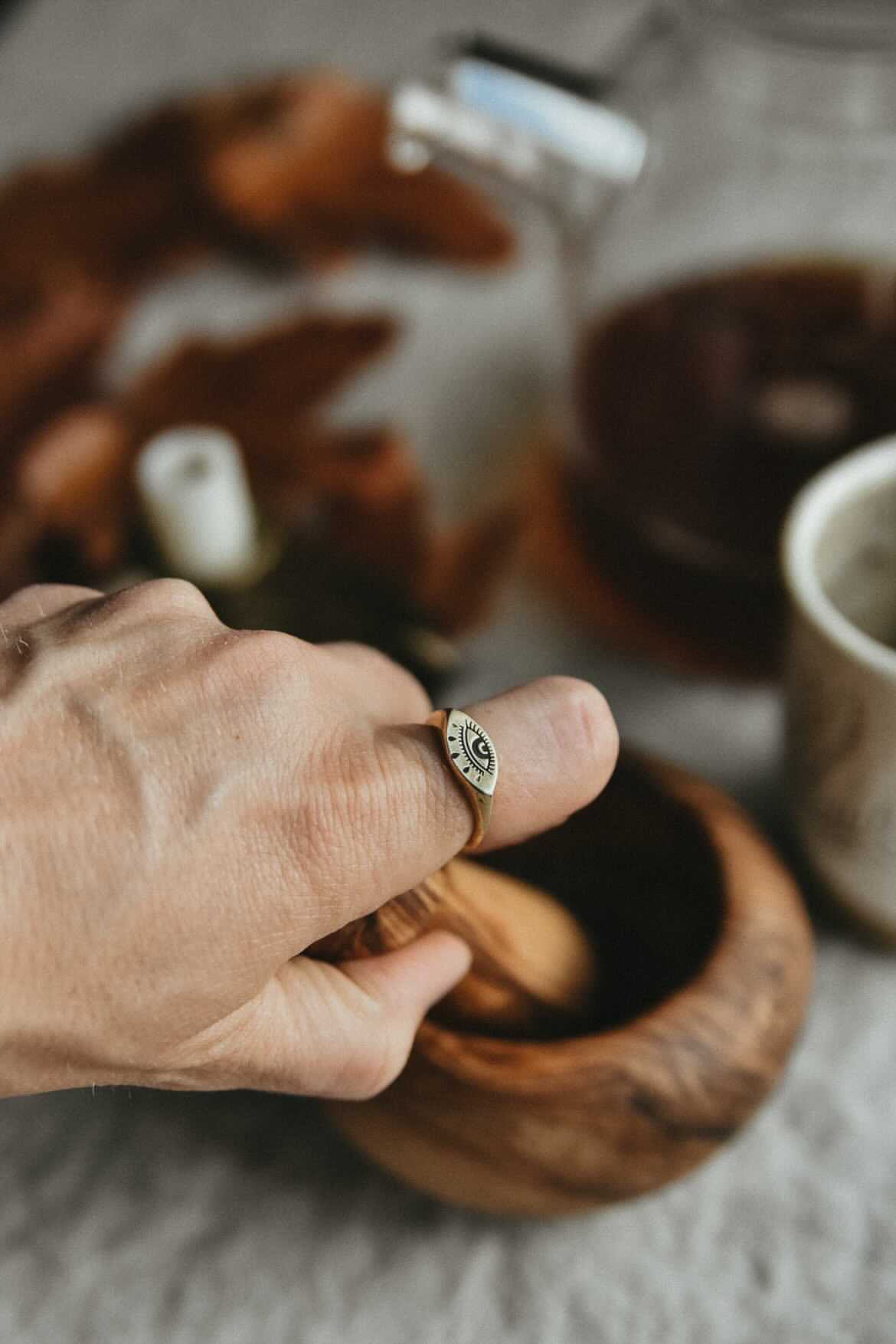 14k gold ring featuring an "Evil Eye" with a patina. Made by Cival Collective in Milwaukee, WI.